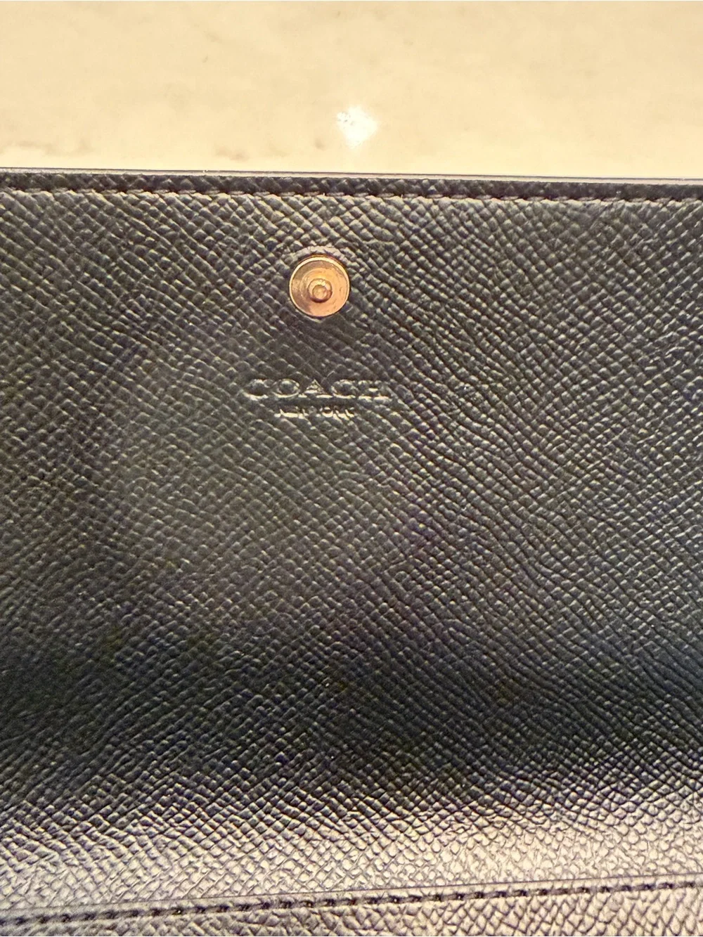Coach Black Leather Clutch Wallet with Gold Accents